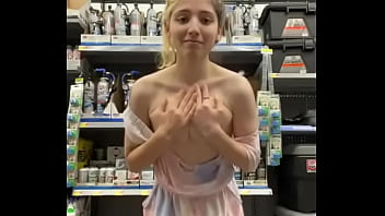 a pretty girl takes off her dress in the bathroom in english
